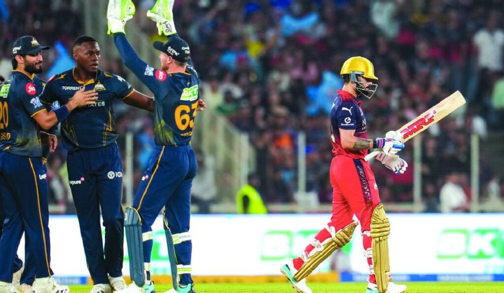 Gujarat Titans players celebrate a four-wicket win over Royal Challengers Bengaluru in IPL 2026 match action.